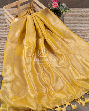 Banarasi Tissue Silk Saree in Yellow paired with pastel blue brocade blouse