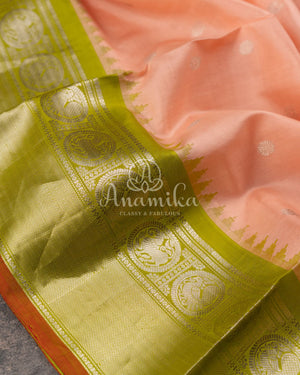 Peach/Green Gadwal Pattu saree with peach blouse