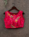 Pink sleeveless blouse with multi color thread work