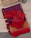Pure silk Plum color Bandini saree with a contrast red handwoven patola border