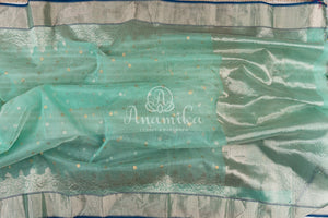 Light Blue Chanderi Silk Saree with a contrast dark blue blouse with lovely work