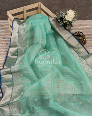 Light Blue Chanderi Silk Saree with a contrast dark blue blouse with lovely work