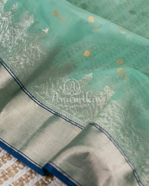 Light Blue Chanderi Silk Saree with a contrast dark blue blouse with lovely work
