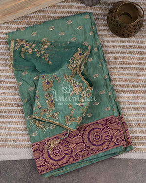 Light Green Crepe silk saree with embroidered buttas and banarasi border