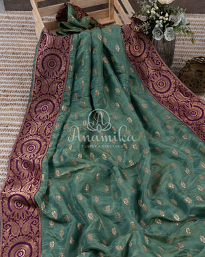 Light Green Crepe silk saree with embroidered buttas and banarasi border