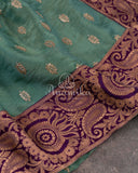 Light Green Crepe silk saree with embroidered buttas and banarasi border