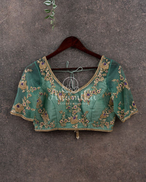 Light Green Crepe silk saree with embroidered buttas and banarasi border