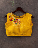 Yellow sleeveless blouse with multi color thread work