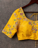 Yellow blouse with multi color thread embroidery