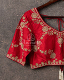 A beautiful Red blouse with all over gold zardosi work
