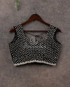 Black sleeveless blouse with all over pearl work - sleeves provided seperately