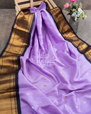 Gadwal pattu saree in a beautiful Lavender/ Dark Navy combo