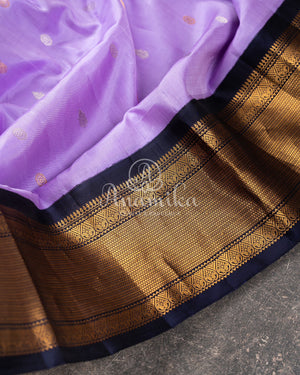Gadwal pattu saree in a beautiful Lavender/ Dark Navy combo
