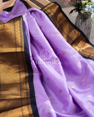 Gadwal pattu saree in a beautiful Lavender/ Dark Navy combo
