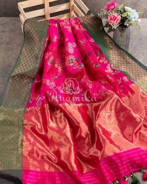 Hot Pink Chanderi pattu saree with a contrast dark green blouse
