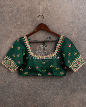 Hot Pink Chanderi pattu saree with a contrast dark green blouse