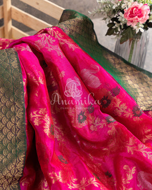 Hot Pink Chanderi pattu saree with a contrast dark green blouse