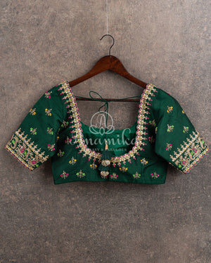 Hot Pink Chanderi pattu saree with a contrast dark green blouse