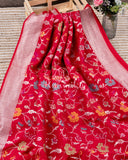 Red Tusser Georgette saree with all over floral jaal, paired with a contrast green blouse