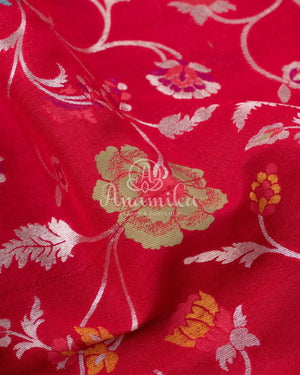 Red Tusser Georgette saree with all over floral jaal, paired with a contrast green blouse