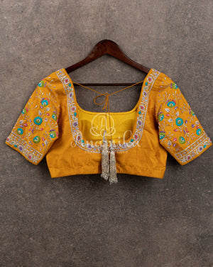 Purple Tusser Georgette saree with all over floral jaal, paired with a contrast mustard yellow blouse