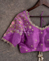 Royal Kanchi Gadwal saree paired with a contrast purple handwork blouse