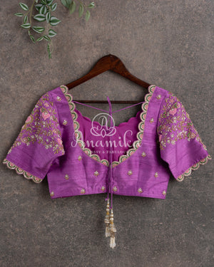 Royal Kanchi Gadwal saree paired with a contrast purple handwork blouse