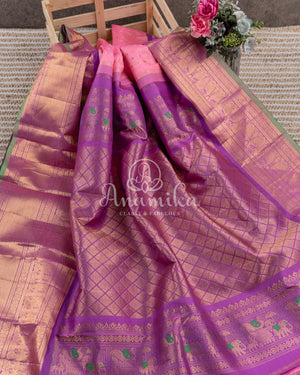Royal Kanchi Gadwal saree paired with a contrast purple handwork blouse