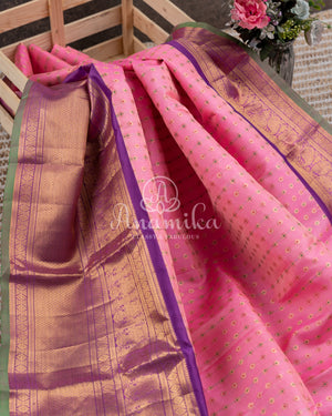 Royal Kanchi Gadwal saree paired with a contrast purple handwork blouse