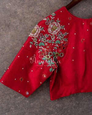 Red blouse with mirror and thread embroidery