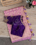 Lilac Banarasi Silk Saree with a contrast purple blouse
