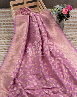 Lilac Banarasi Silk Saree with a contrast purple blouse