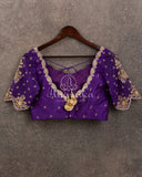 Lilac Banarasi Silk Saree with a contrast purple blouse