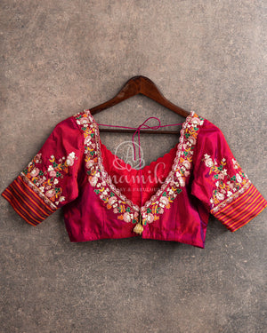 Peach Twill Silk Saree with maroonish red handwoven patola border