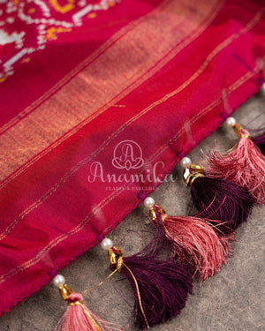 Peach Twill Silk Saree with maroonish red handwoven patola border