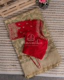 Mehendi Green Kora Jamdaani paired with a stunning red scallop work blouse