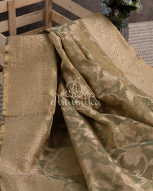 Mehendi Green Kora Jamdaani paired with a stunning red scallop work blouse