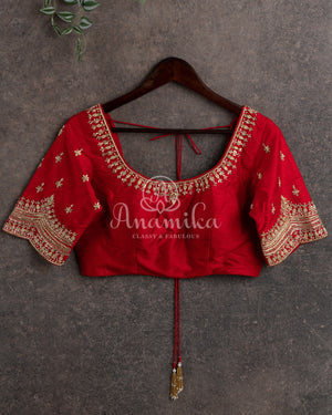 Mehendi Green Kora Jamdaani paired with a stunning red scallop work blouse