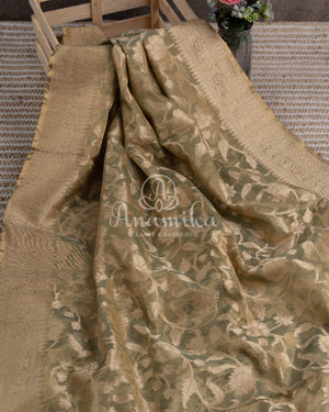 Mehendi Green Kora Jamdaani paired with a stunning red scallop work blouse