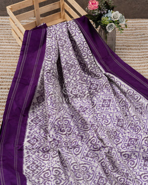 White/Purple Ikkat Silk Saree with purple puff sleeves blouse