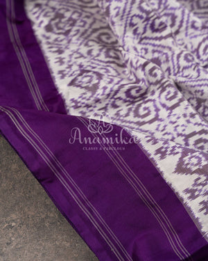 White/Purple Ikkat Silk Saree with purple puff sleeves blouse
