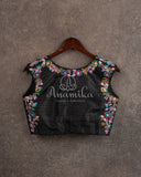 Black sleeveless blouse with multi color cutdana work