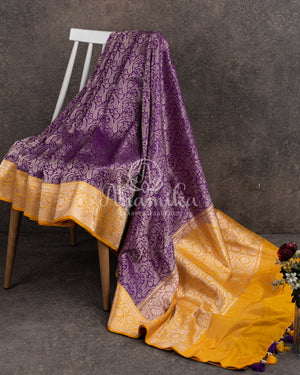 Royal Purple Banarasi saree with a graceful yellow border