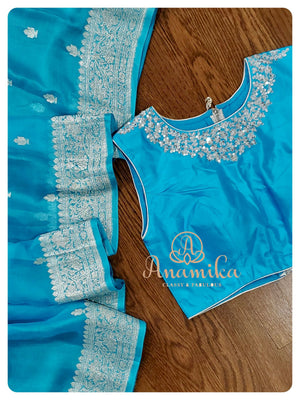 Blue Banarasi Chiffon Saree with sleeveless blouse