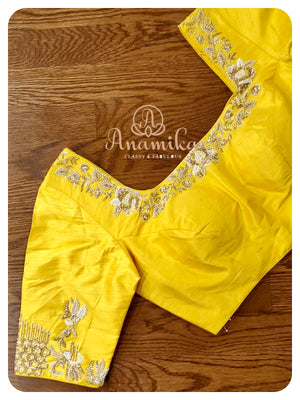 Blue Bandinid Gharchola with a Yellow Blouse
