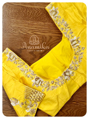 Blue Bandinid Gharchola with a Yellow Blouse