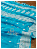 Blue Banarasi Chiffon Saree with sleeveless blouse