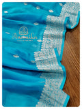 Blue Banarasi Chiffon Saree with sleeveless blouse