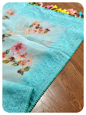 Pastel Blue Organza saree with pink handworked blouse