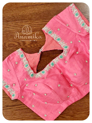 Pastel Blue Organza saree with pink handworked blouse